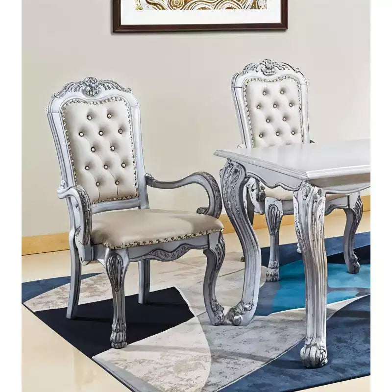 HomeRoots Set of Two Tufted White Upholstered Faux Leather And Wood Dining Arm Chairs