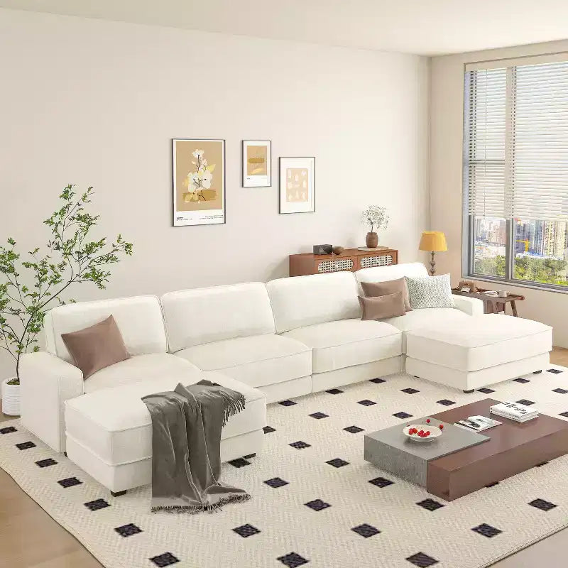 Dyonery large four-seater sofa, with a simple appearance, made of Chenille fabric, featuring a combination of sturdy high legs and wide armrests