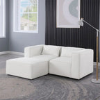 Divano in ciniglia con gambe e pouf