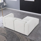 Divano in ciniglia con gambe e pouf