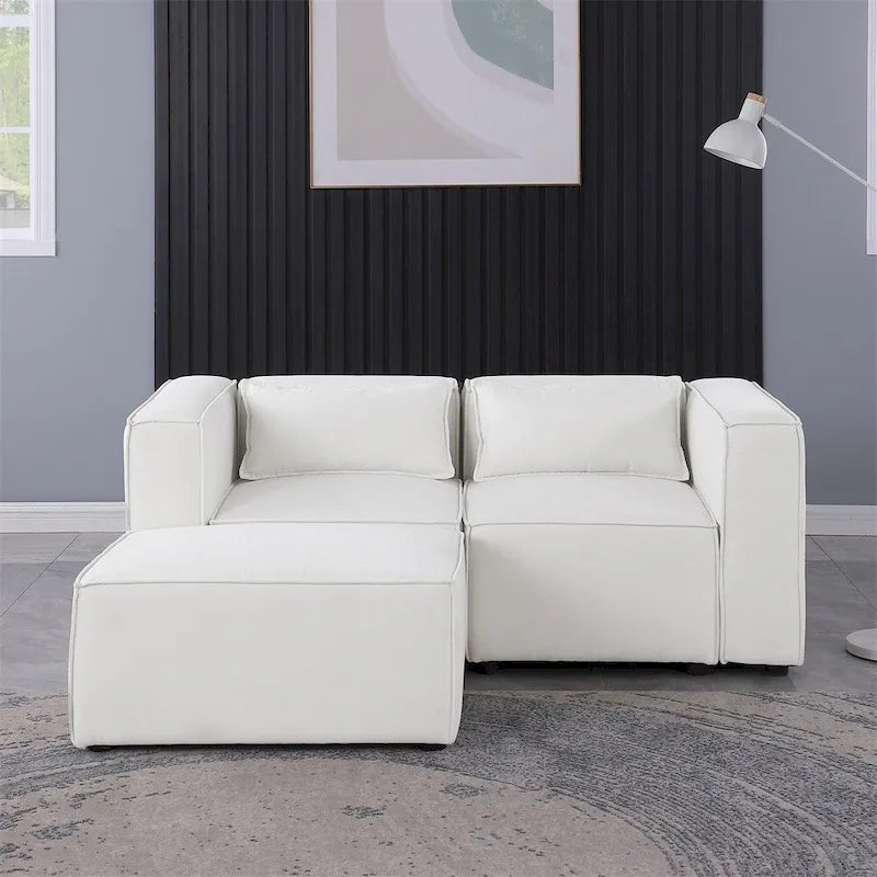 Divano in ciniglia con gambe e pouf