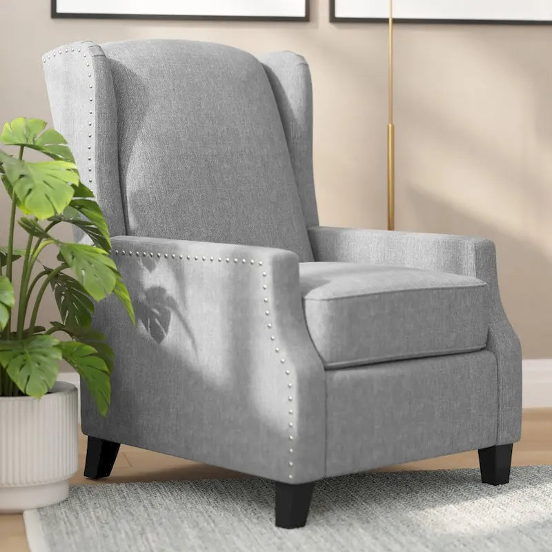 Poltrona reclinabile a molla con tasca laterale e finitura con borchie decorative