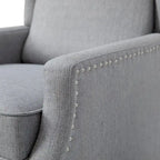 Poltrona reclinabile a molla con tasca laterale e finitura con borchie decorative