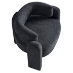 Poltrona d'accento rivestita in bouclé