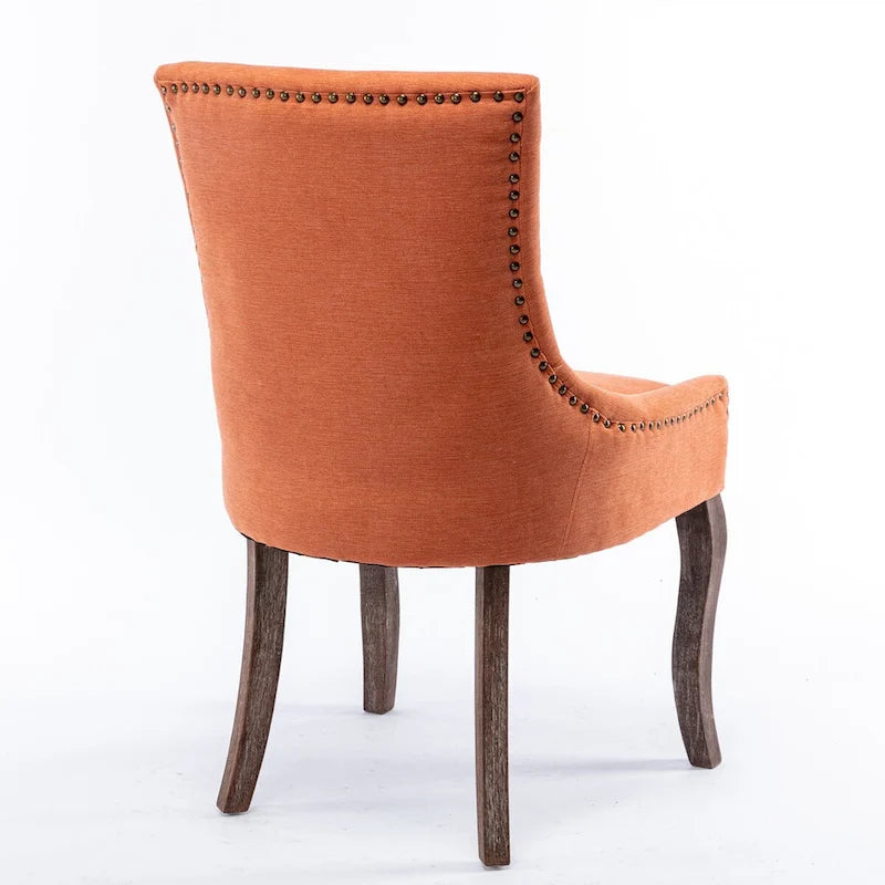 Ultra Side Dining ChairThickened fabric chairs with neutrally toned solid wood legs Bronze nail headSet of 2Blue